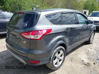 2016 Ford Escape SE z VIN 1FMCU9GX2GUA47702, wystawiony jako IAAI lot #42160145 z przebiegiem 90 765 mil mil oraz . Historia ofert i sprzedaży dostępna na DreamBid. Obrazek 4.