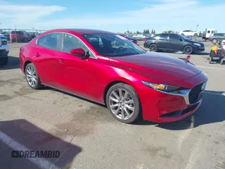 2023 Mazda 3 S Select with VIN 3MZBPABM4PM378921, listed as a IAAI auction lot 41549555 with 13,706 mi miles and . Bid and sale history available at DreamBid. Image 1.