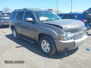 2013 Chevrolet Tahoe LT with VIN 1GNSKBE09DR325729, listed as a IAAI auction lot 41989587 with 186,361 mi miles and . Bid and sale history available at DreamBid. Image 1.