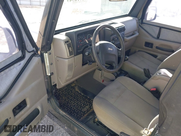2006 Jeep Wrangler Rubicon z VIN 1J4FA69SX6P788424, wystawiony jako IAAI lot #41712349 z przebiegiem 121 684 mil mil oraz . Historia ofert i sprzedaży dostępna na DreamBid. Obrazek 22.