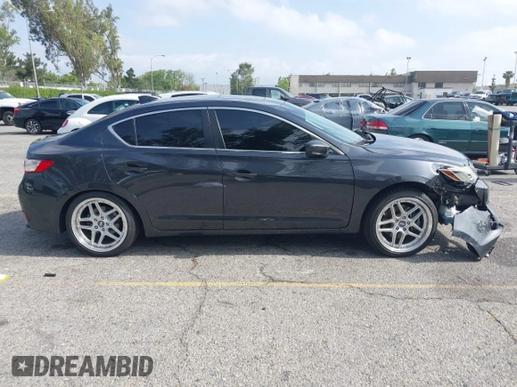 2016 Acura ILX Premium z VIN 19UDE2F76GA013196, wystawiony jako IAAI lot #42216841 z przebiegiem 73 867 mil mil oraz . Historia ofert i sprzedaży dostępna na DreamBid. Obrazek 13.