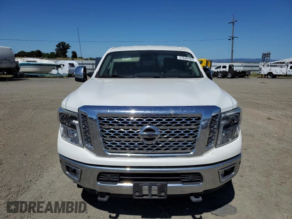 2017 Nissan Titan Pro-4X z VIN 1N6BA1F40HN559615, wystawiony jako Copart lot #57636455 z przebiegiem 99 803 mil mil oraz Szkoda całkowita • Salvage title. Historia ofert i sprzedaży dostępna na DreamBid. Obrazek 5.