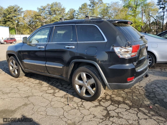 2012 Jeep Grand Cherokee Overland with VIN 1C4RJFCG4CC292383, listed as a Copart auction lot 51168385 with 132,697 mi miles and Salvage Title. Bid and sale history available at carsss.com. Image 2.