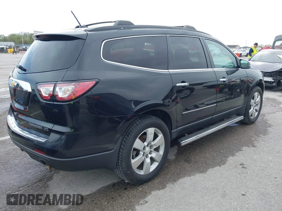 2014 Chevrolet Traverse LTZ with VIN 1GNKRJKD1EJ203282, listed as a IAAI auction lot 41984380 with 219,819 mi miles and . Bid and sale history available at DreamBid. Image 4.