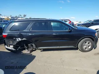 2013 Dodge Durango Crew with VIN 1C4RDHDG1DC666094, listed as a IAAI auction lot 41940121 with 93,131 mi miles and . Bid and sale history available at carsss.com. Image 14.