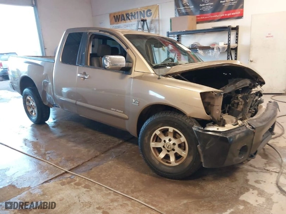2004 Nissan Titan XE with VIN 1N6AA06A24N553627, listed as a IAAI auction lot 41427471 with 307,124 mi miles. Bid and sale history available at carsss.com. Image 1.