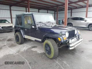 1999 Jeep Wrangler Sport with VIN 1J4FY19S1XP402974, listed as a IAAI auction lot 41659511 with 152,024 mi miles. Bid and sale history available at carsss.com. Image 1.