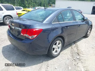 2014 Chevrolet Cruze 1LT with VIN 1G1PC5SB6E7226990, listed as a IAAI auction lot 42490123 with 125,256 mi miles and . Bid and sale history available at DreamBid. Image 4.