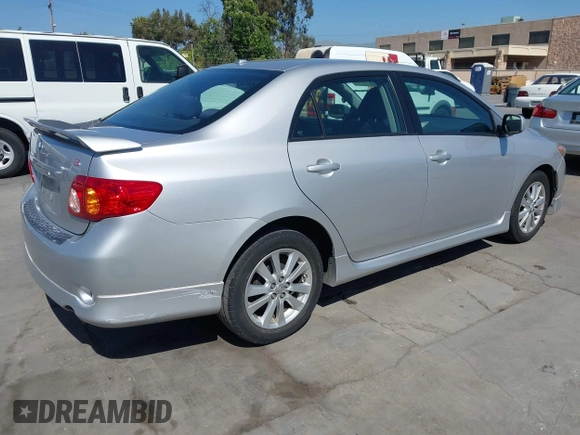 2009 Toyota Corolla with VIN 1NXBU40E69Z045543, listed as a IAAI auction lot 42201200 with 143,533 mi miles. Bid and sale history available at carsss.com. Image 4.