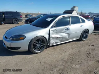 2014 Chevrolet Impala Limited LTZ with VIN 2G1WC5E33E1102480, listed as a IAAI auction lot 41666058 with NaN miles. Bid and sale history available at carsss.com. Image 2.