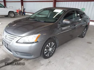 2015 Nissan Sentra S with VIN 3N1AB7AP9FY256920, listed as a IAAI auction lot 41491292 with 163,404 mi miles and . Bid and sale history available at DreamBid. Image 2.