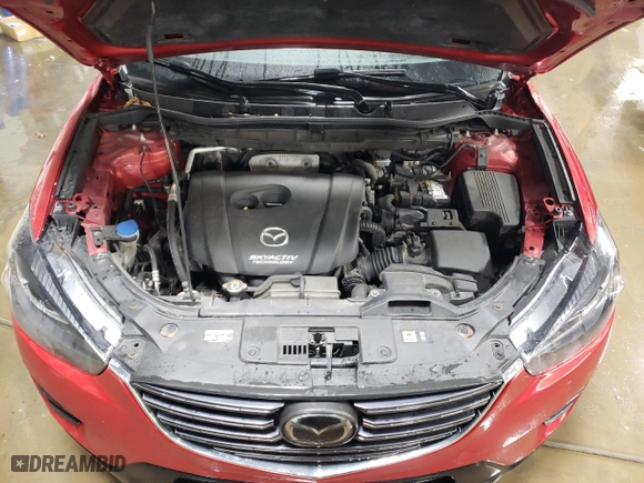 2016 Mazda CX-5 Grand Touring with VIN JM3KE4DY7G0703730, listed as a Copart auction lot 45937475 with 58,748 mi miles and Salvage Title. Bid and sale history available at carsss.com. Image 11.