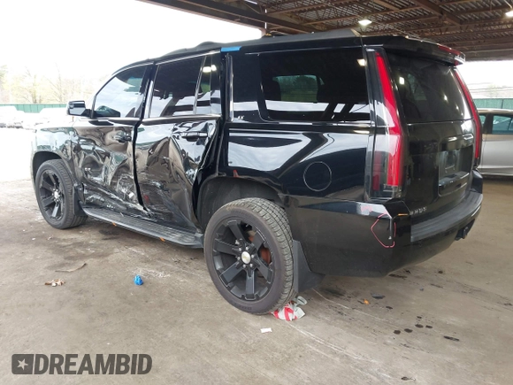 2015 Chevrolet Tahoe LT with VIN 1GNSKBKCXFR604401, listed as a IAAI auction lot 42048559 with 60,768 mi miles and . Bid and sale history available at DreamBid. Image 3.
