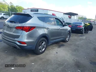 2017 Hyundai Santa Fe 2.4L z VIN 5NMZU3LB7HH025791, wystawiony jako IAAI lot #42277964 z przebiegiem 154 110 mil mil oraz . Historia ofert i sprzedaży dostępna na DreamBid. Obrazek 4.