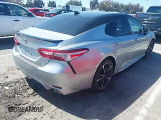 2020 Toyota Camry XSE with VIN 4T1K61AK1LU318098, listed as a IAAI auction lot 41838182 with 64,118 mi miles and . Bid and sale history available at DreamBid. Image 4.