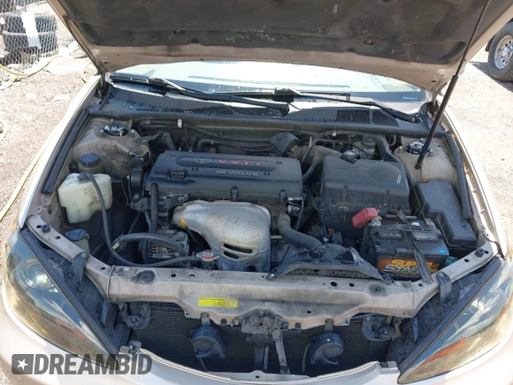2002 Toyota Camry LE z VIN 4T1BE32K42U592181, wystawiony jako IAAI lot #42206721 z przebiegiem 299 947 mil mil oraz . Historia ofert i sprzedaży dostępna na DreamBid. Obrazek 10.
