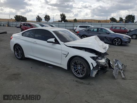2015 BMW M4 with VIN WBS3R9C53FK334270, listed as a Copart auction lot 68763514 with 71,816 mi miles and Salvage Title. Bid and sale history available at carsss.com. Image 4.