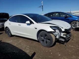 2023 Tesla Model 3 with VIN 5YJ3E1EA9PF558527, listed as a Copart auction lot 48754535 with 21,801 mi miles and Salvage Title. Bid and sale history available at DreamBid. Image 4.