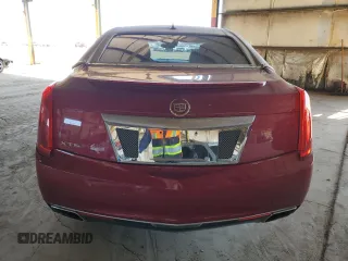 2014 Cadillac XTS Luxury z VIN 2G61M5S37E9126661, wystawiony jako Copart lot #53535315 z przebiegiem 111 469 mil mil oraz Szkody całkowita. Historia ofert i sprzedaży dostępna na DreamBid. Obrazek 6.