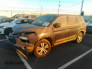 2016 Honda Pilot EX-L with VIN 5FNYF5H56GB052226, listed as a IAAI auction lot 39296292 with 33,056 mi miles and . Bid and sale history available at DreamBid. Image 2.