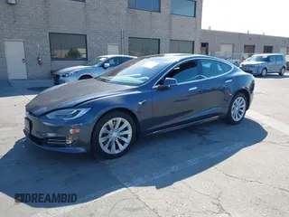 2018 Tesla Model S 75D with VIN 5YJSA1E26JF249573, listed as a IAAI auction lot 42748801 with 88,467 mi miles and . Bid and sale history available at DreamBid. Image 2.