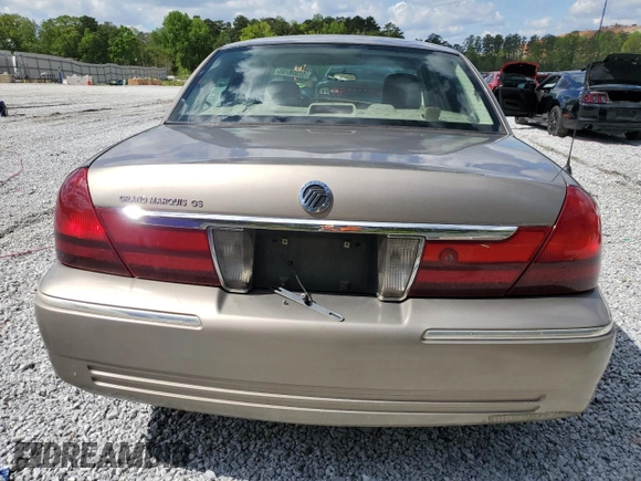 2005 Mercury Grand Marquis GS z VIN 2MEFM74W05X673934, wystawiony jako Copart lot #52608785 z przebiegiem 170 558 mil mil oraz Szkody całkowita. Historia ofert i sprzedaży dostępna na DreamBid. Obrazek 6.