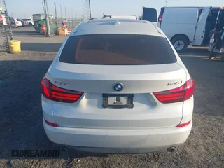 2015 BMW 5 Series 535i Gran Turismo with VIN WBA5M2C51FD872215, listed as a IAAI auction lot 41787558 with 96,768 mi miles and . Bid and sale history available at DreamBid. Image 16.