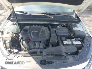 2015 Kia Optima LX with VIN KNAGM4A76F5663782, listed as a IAAI auction lot 42162942 with 128,321 mi miles. Bid and sale history available at carsss.com. Image 10.