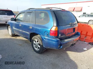 2006 GMC Envoy SLE with VIN 1GKDS13SX62315193, listed as a IAAI auction lot 41866029 with 231,164 mi miles. Bid and sale history available at carsss.com. Image 3.