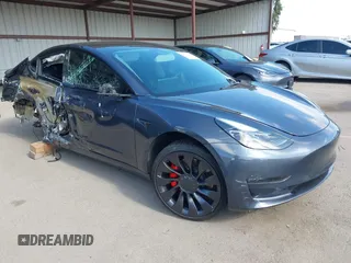 2023 Tesla Model 3 Performance z VIN 5YJ3E1ECXPF410212, wystawiony jako IAAI lot #42146683 z przebiegiem 42 708 mil mil oraz . Historia ofert i sprzedaży dostępna na DreamBid. Obrazek 1.