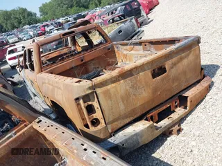 2018 GMC Sierra 2500HD Denali z VIN 1GT12UEG7JF169961, wystawiony jako IAAI lot #37206408 z przebiegiem Nie podano mil oraz . Historia ofert i sprzedaży dostępna na DreamBid. Obrazek 3.