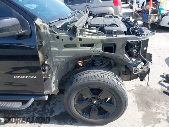 2016 Chevrolet Colorado 2WD LT z VIN 1GCGSCE3XG1213278, wystawiony jako IAAI lot #41931752 z przebiegiem 103 622 mil mil oraz . Historia ofert i sprzedaży dostępna na DreamBid. Obrazek 19.