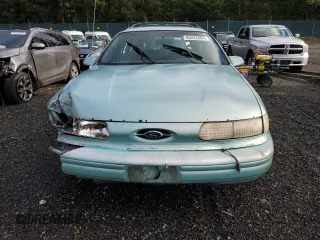 1994 Ford Taurus with VIN 1FALP5747RG236623, listed as a Copart auction lot 85242504 with 205,550 mi miles and Salvage title. Bid and sale history available at DreamBid. Image 5.