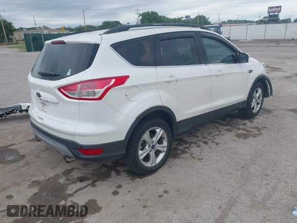 2014 Ford Escape SE with VIN 1FMCU9GX2EUA62133, listed as a IAAI auction lot 42342688 with Not provided miles and . Bid and sale history available at DreamBid. Image 4.