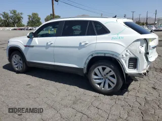 2022 Volkswagen Atlas SE с VIN 1V2JE2CA1NC205661, выставлен на аукционе Copart как лот 57092015 с пробегом 50 936 миль миль и Списание • Salvage title. История ставок и продаж доступна на DreamBid. Изображение 2.