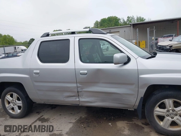 2012 Honda Ridgeline RTL with VIN 5FPYK1F58CB454385, listed as a IAAI auction lot 42212805 with 207,874 mi miles and . Bid and sale history available at DreamBid. Image 6.