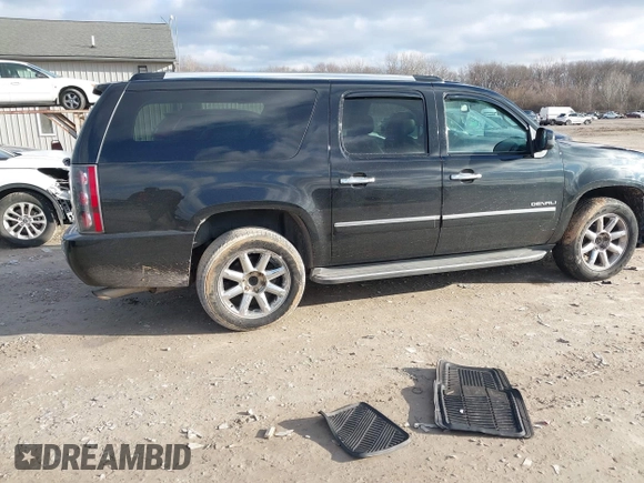 2012 GMC Yukon XL Denali with VIN 1GKS2MEF7CR200790, listed as a IAAI auction lot 41215279 with 147,663 mi miles. Bid and sale history available at carsss.com. Image 4.