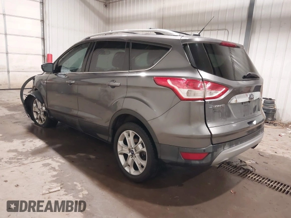 2014 Ford Escape Titanium with VIN 1FMCU9JX9EUA56421, listed as a IAAI auction lot 41392372 with 117,234 mi miles. Bid and sale history available at carsss.com. Image 3.
