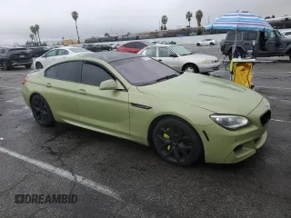 2013 BMW 6 Series 650i with VIN WBA6B2C59DDG66909, listed as a Copart auction lot 86329014 with 131,054 mi miles and Salvage Title. Bid and sale history available at DreamBid. Image 4.