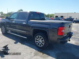 2015 GMC Sierra 1500 Denali with VIN 3GTU2WEC2FG422289, listed as a IAAI auction lot 42023170 with 165,856 mi miles and . Bid and sale history available at DreamBid. Image 3.