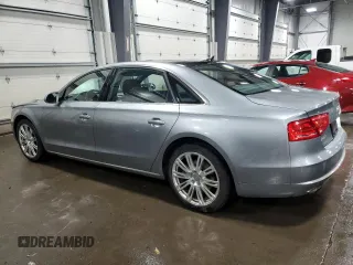 2014 Audi A8 3.0T z VIN WAURGAFD7EN005416, wystawiony jako Copart lot #42625745 z przebiegiem 141 244 mil mil oraz Szkoda całkowita • Salvage title. Historia ofert i sprzedaży dostępna na DreamBid. Obrazek 2.
