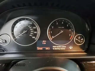 2013 BMW 5 Series 550i xDrive with VIN WBAFU9C57DDY70477, listed as a Copart auction lot 48577095 with 137,695 mi miles and Salvage Title. Bid and sale history available at carsss.com. Image 9.