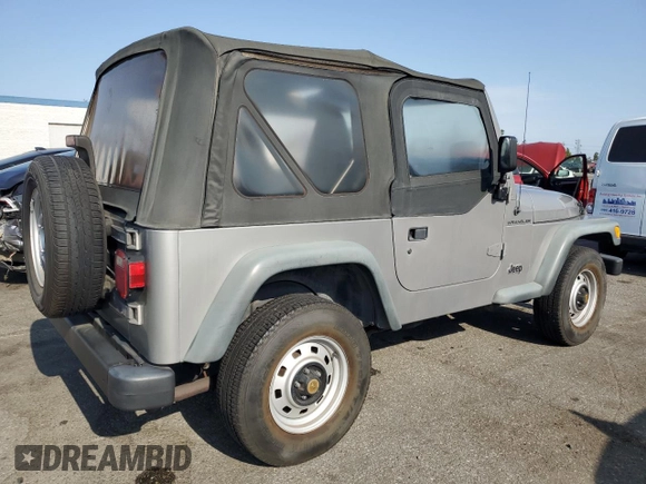 2000 Jeep Wrangler SE with VIN 1J4FA29P3YP770094, listed as a Copart auction lot 65419385 with 150,364 mi miles and Clean title. Bid and sale history available at DreamBid. Image 3.
