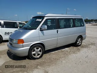 2003 Volkswagen EuroVan MV с VIN WV2NB470X3H012578, выставлен на аукционе Copart как лот 57024825 с пробегом 87 718 миль миль и Чистый • Clean title. История ставок и продаж доступна на DreamBid. Изображение 1.