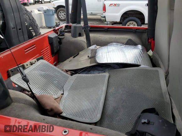 2003 Jeep Wrangler Rubicon z VIN 1J4FA69S43P321494, wystawiony jako Copart lot #43614905 z przebiegiem 99 001 mil mil oraz Czysty tytuł • Clean title. Historia ofert i sprzedaży dostępna na DreamBid. Obrazek 11.
