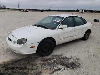 1999 Ford Taurus SE z VIN 1FAFP53U1XG144195, wystawiony jako Copart lot #89224415 z przebiegiem 126 810 mil mil oraz Szkody całkowita. Historia ofert i sprzedaży dostępna na DreamBid. Obrazek 1.