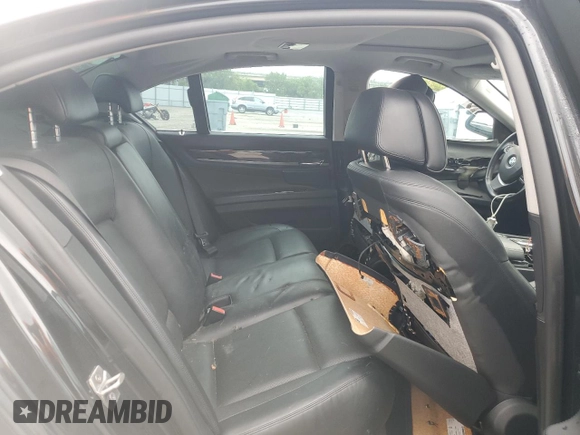 2013 BMW 7 Series 750i xDrive z VIN WBAYB6C53DC997908, wystawiony jako Copart lot #74759314 z przebiegiem Nie podano mil oraz Szkoda całkowita • Salvage title. Historia ofert i sprzedaży dostępna na DreamBid. Obrazek 10.