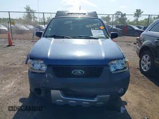 2005 Ford Escape XLT z VIN 1FMCU931X5KD62886, wystawiony jako IAAI lot #42564007 z przebiegiem 134 080 mil mil oraz . Historia ofert i sprzedaży dostępna na DreamBid. Obrazek 12.