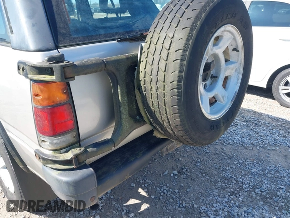 1995 Isuzu Rodeo z VIN 4S2CM58V4S4363500, wystawiony jako IAAI lot #41821801 z przebiegiem 94 480 mil mil oraz . Historia ofert i sprzedaży dostępna na DreamBid. Obrazek 6.