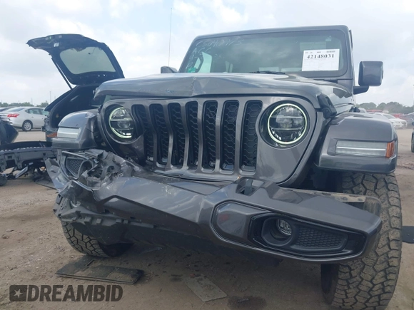 2021 Jeep Gladiator Overland with VIN 1C6HJTFG4ML617175, listed as a IAAI auction lot 42148031 with 70,627 mi miles and . Bid and sale history available at DreamBid. Image 6.